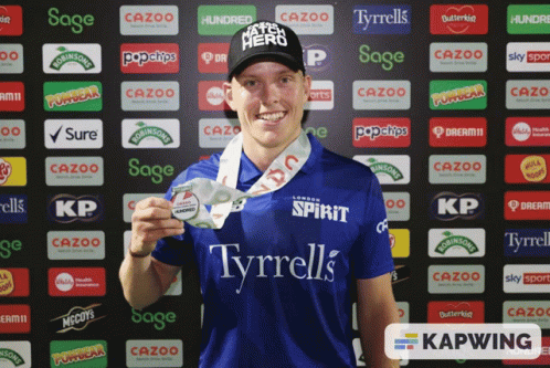 A Man Wearing A Blue Shirt That Says Tyrrell 'S On It GIF