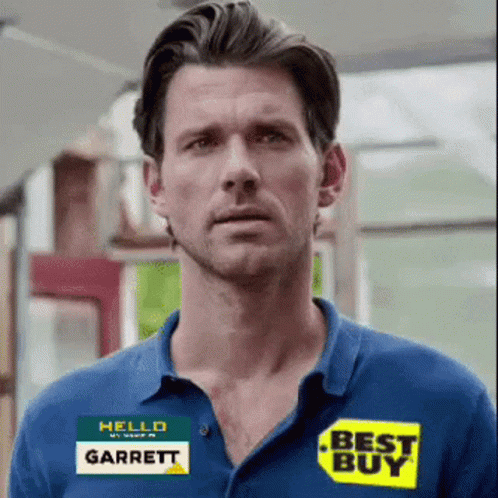 A Man Wearing A Blue Shirt With A Best Buy Sticker On It GIF