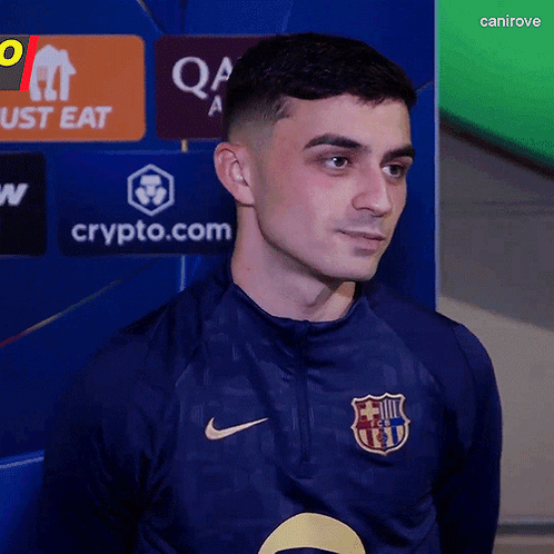 A Man Wearing A Blue Shirt With A Fcb Logo On It GIF