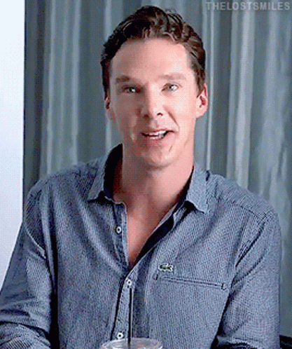 A Man Wearing A Blue Shirt With A Lacoste Logo On His Chest GIF