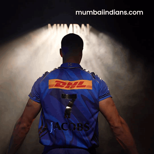 A Man Wearing A Blue Shirt With Dhl On The Back GIF