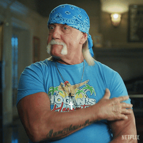 A Man Wearing A Blue Shirt With Hogan 'S Hawaii On It GIF
