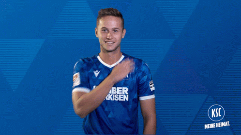 A Man Wearing A Blue Shirt With Ksc On It GIF