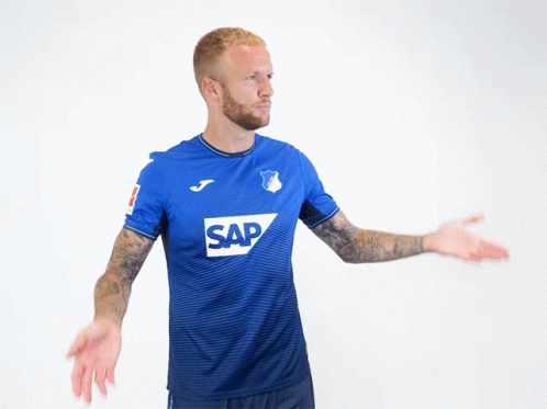 A Man Wearing A Blue Shirt With Sap On It GIF