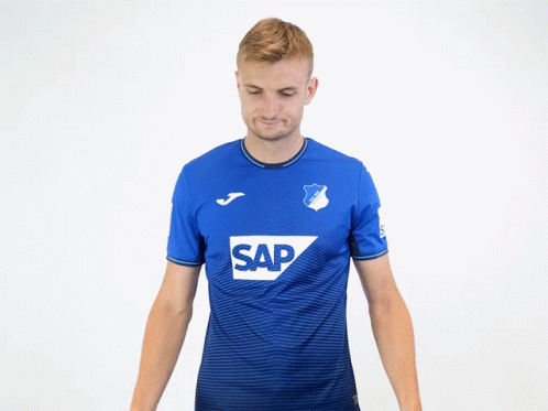 A Man Wearing A Blue Shirt With Sap On It GIF