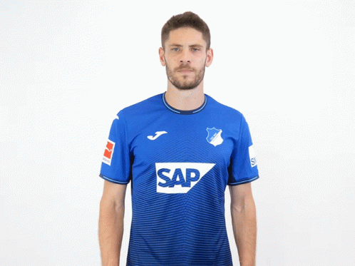 A Man Wearing A Blue Shirt With The Word Sap On The Front GIF