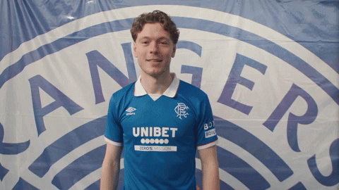 A Man Wearing A Blue Shirt With The Word Unibet On The Front GIF