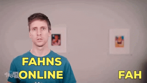 A Man Wearing A Blue Shirt With The Words Fahns Online Written On It GIF