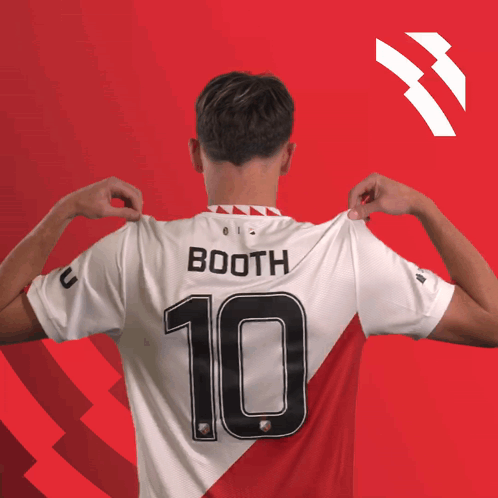 A Man Wearing A Booth Jersey With The Number 10 GIF