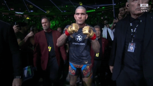 A Man Wearing A Boxing Glove That Says Ufc Live On It GIF