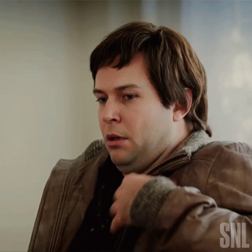 A Man Wearing A Brown Leather Jacket With The Snl Logo On The Bottom GIF