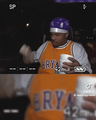 Man In Brya Jersey Holding Cup GIF