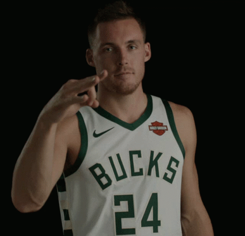 A Man Wearing A Bucks Jersey Is Giving A Middle Finger GIF