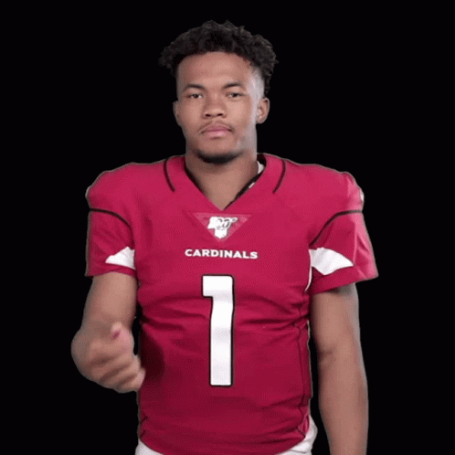 A Man Wearing A Cardinals Jersey Points Up GIF