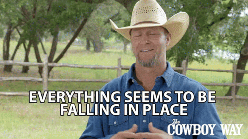 A Man Wearing A Cowboy Hat And A Blue Shirt Says Everything Seems To Be Falling In Place GIF