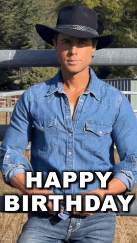 a man wearing a cowboy hat and a denim shirt is sitting in front of a fence and says happy birthday