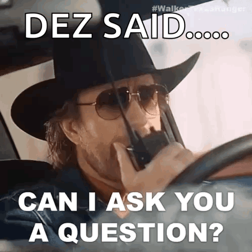 Man In Cowboy Hat And Sunglasses Talking On Walkie Talkie GIF