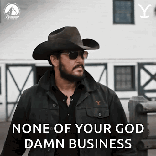 A Man Wearing A Cowboy Hat And Sunglasses Says " None Of Your God Damn Business " GIF