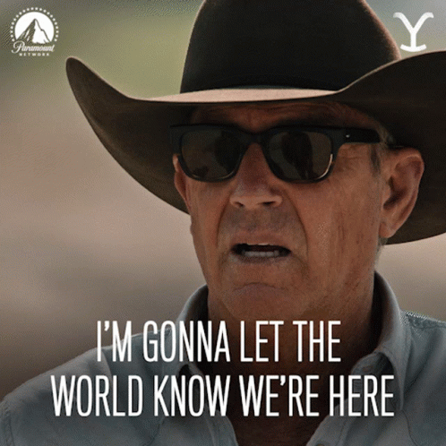 A Man Wearing A Cowboy Hat And Sunglasses With The Words I 'M Gonna Let The World Know We 'Re Here GIF