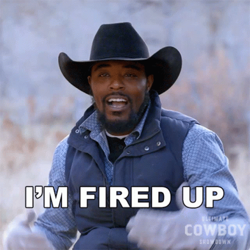 A Man Wearing A Cowboy Hat And Vest Says I 'M Fired Up GIF
