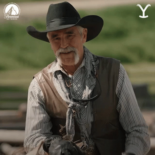A Man Wearing A Cowboy Hat And Vest With A Paramount Network Logo GIF