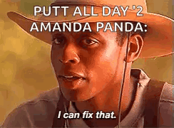 A Man Wearing A Cowboy Hat Is Talking To A Panda . GIF