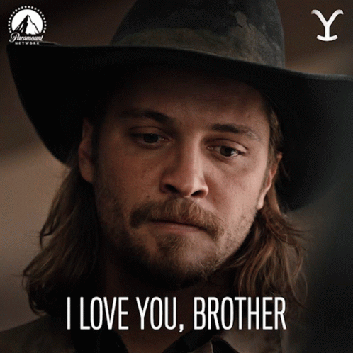 A Man Wearing A Cowboy Hat With The Words I Love You Brother Below Him GIF