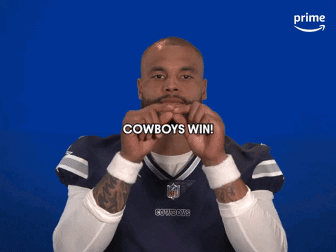 A Man Wearing A Cowboys Jersey Says Cowboys Win On A Blue Background GIF