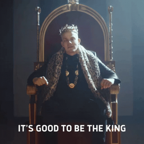 A Man Wearing A Crown Is Sitting On A Throne With The Words It 'S Good To Be The King Above Him GIF