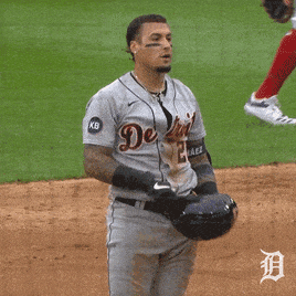 A Man Wearing A Detroit Jersey Holds His Hand To His Mouth GIF