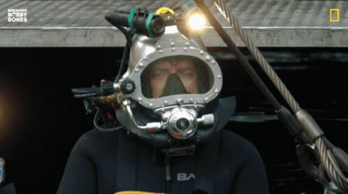 A Man Wearing A Diving Suit With The Letter Ba On The Front GIF