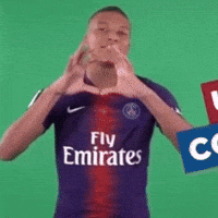 A Man Wearing A Fly Emirates Jersey Makes A Heart Shape With His Hands GIF