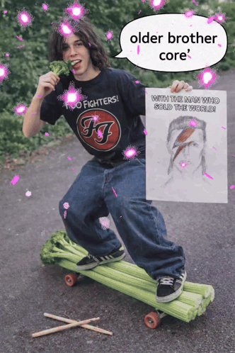 A Man Wearing A Foo Fighters Shirt Is Riding A Skateboard With Celery GIF