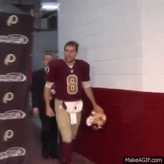 A Man Wearing A Football Jersey With The Number 8 On It GIF
