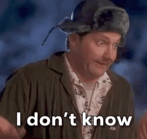 A Man Wearing A Fur Hat Is Making A Funny Face And Saying `` I Don T Know '' . GIF