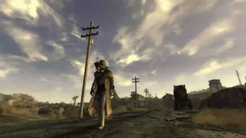 A Man Wearing A Gas Mask Is Walking Down A Street In A Video Game GIF