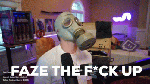 A Man Wearing A Gas Mask Says " Faze The F * Ck Up " While Sitting In Front Of A Microphone GIF