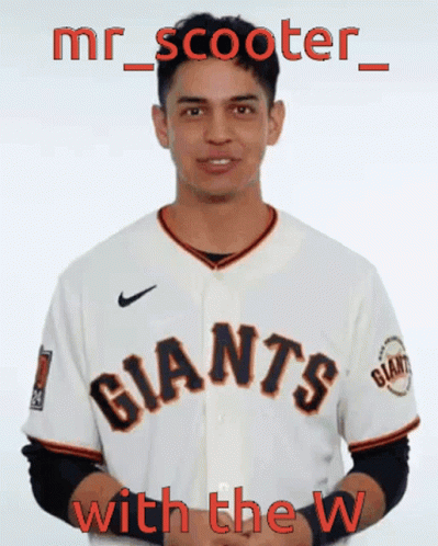 a man wearing a giants jersey says mr scooter with the w.