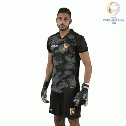 A Man Wearing A Givova Shirt And Shorts GIF