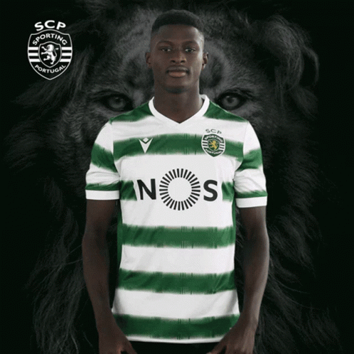 A Man Wearing A Green And White Striped Shirt That Says Nos On It GIF