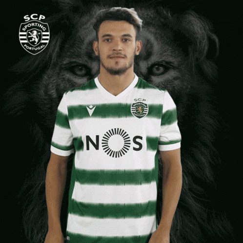 A Man Wearing A Green And White Striped Shirt That Says Scp Sporting Portugal GIF