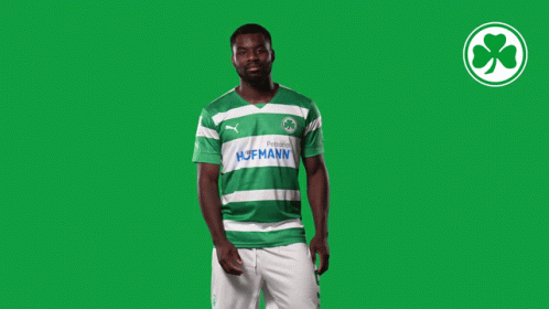 A Man Wearing A Green And White Striped Shirt With Hofmann Written On It GIF