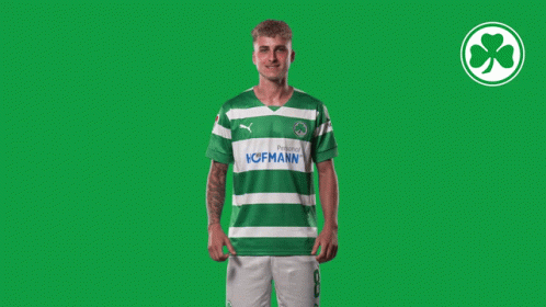 A Man Wearing A Green And White Striped Shirt With The Word Hofmann On It GIF