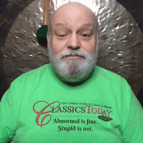 A Man Wearing A Green Classics Today T-Shirt GIF