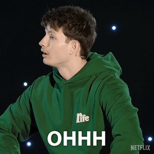 A Man Wearing A Green Hoodie That Says Life On It GIF