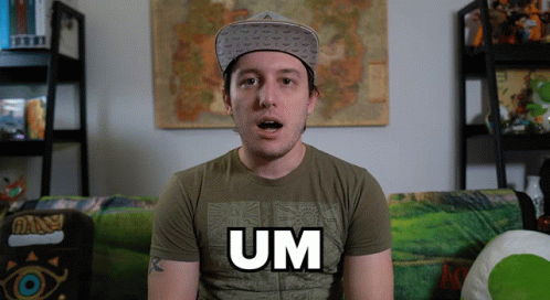 A Man Wearing A Green Shirt That Says Um GIF