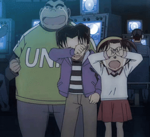 a man wearing a green shirt that says ' uni ' on it