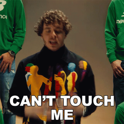 A Man Wearing A Green Sweater Says " Can 'T Touch Me " GIF