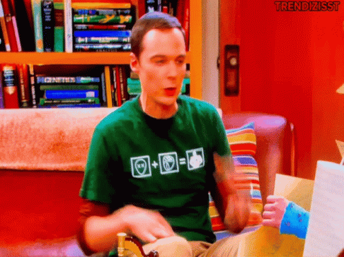 Man Wearing Green T-Shirt With Plus Sign GIF