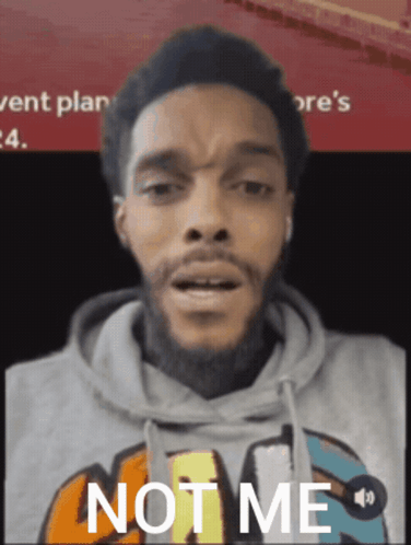 A Man Wearing A Grey Hoodie Says Not Me GIF